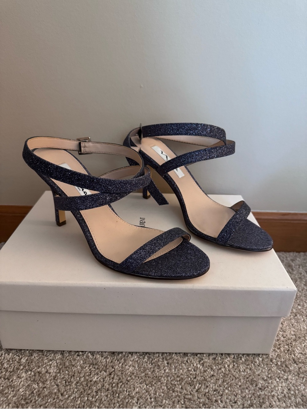 Nina glitter heel sandals.